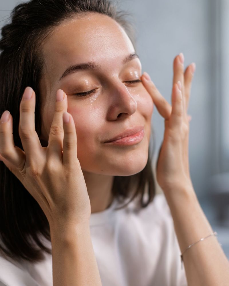 Bride applying skincare